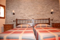 Habitació doble amb dos llits individuals de'El Racó de Cal Maró' 